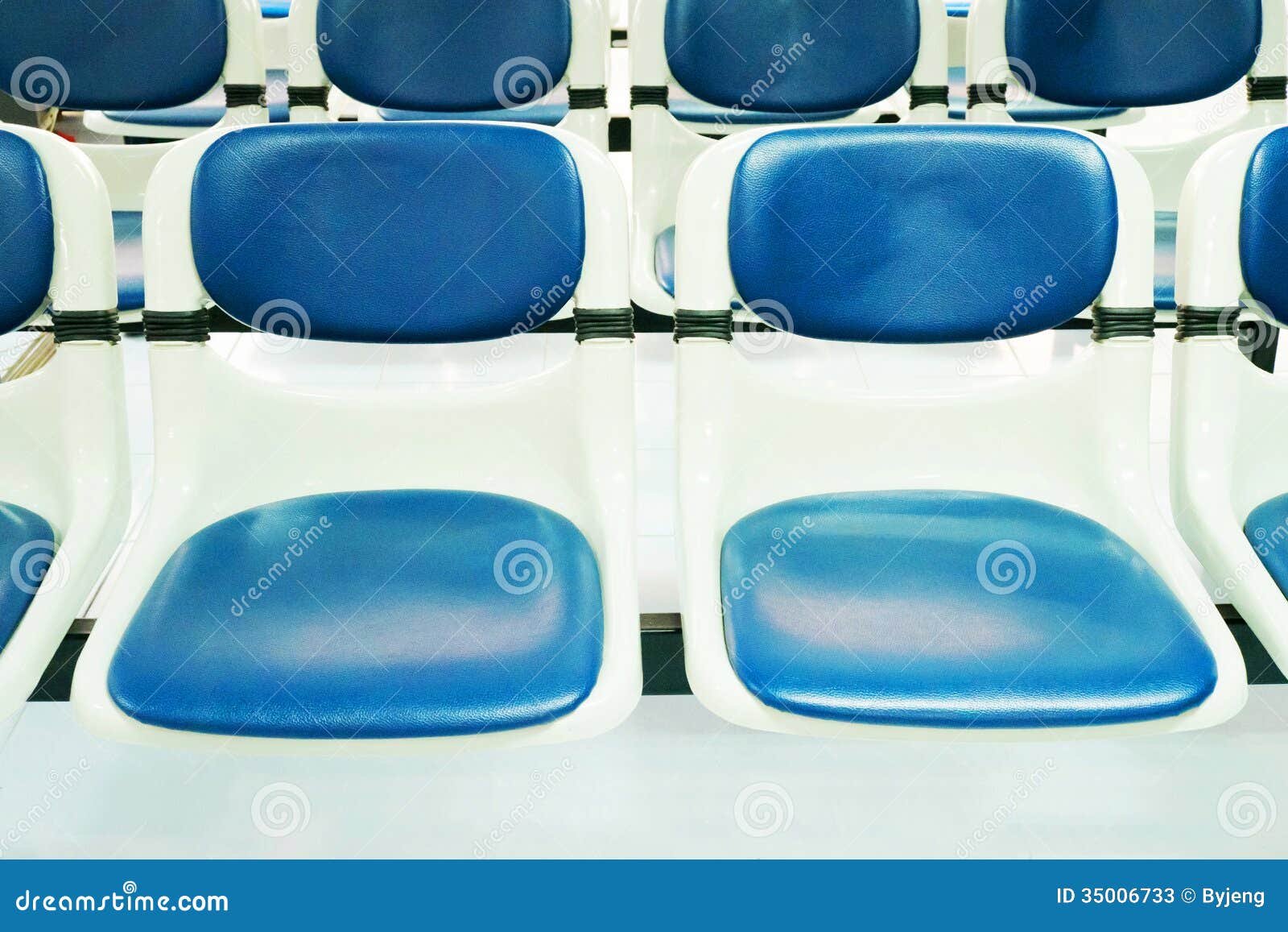 Plastic chairs stock image. Image of seat, game, field 35006733