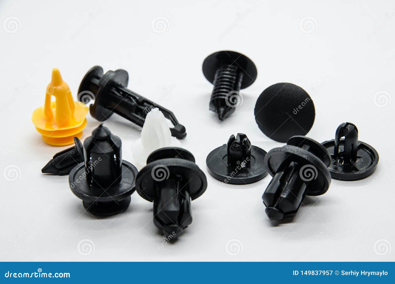 Macro shot plastic black clips for the car. Panel plastic rivets Isolated  on a white background. Automotive clips . Auto plastic fasteners. Clip or  au Stock Photo - Alamy