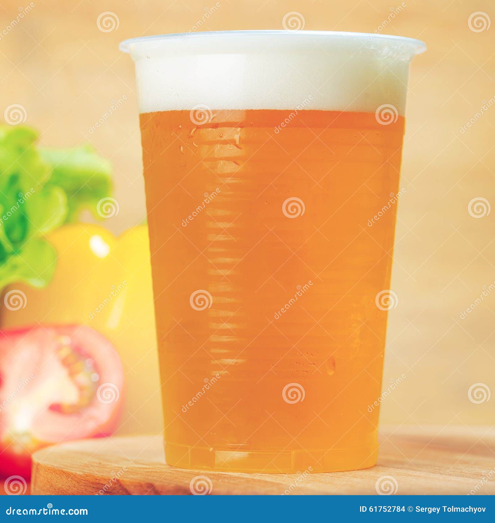 Plastic cups of beer stock photo. Image of beer, rock 61752784