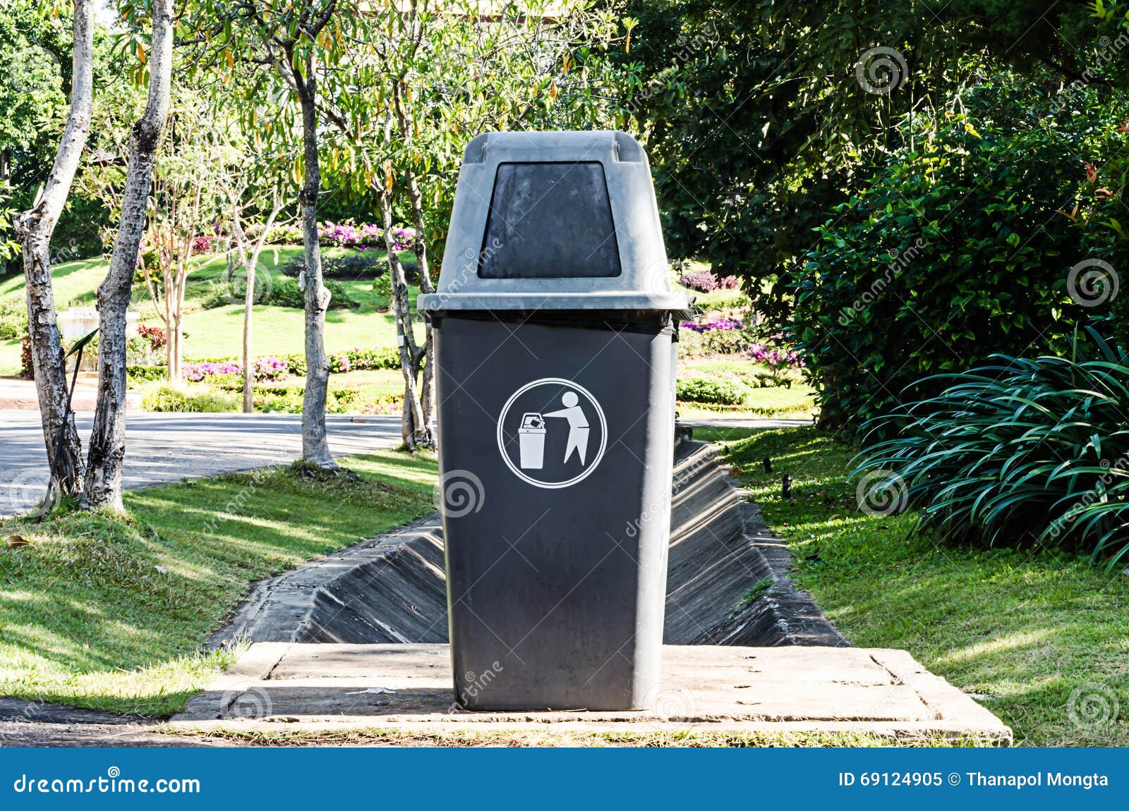 Plastic dust bin in garden stock image. Image of bins 69124905