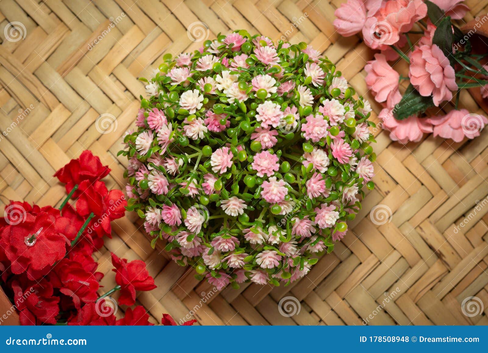 plastic flower decaration on handmade background