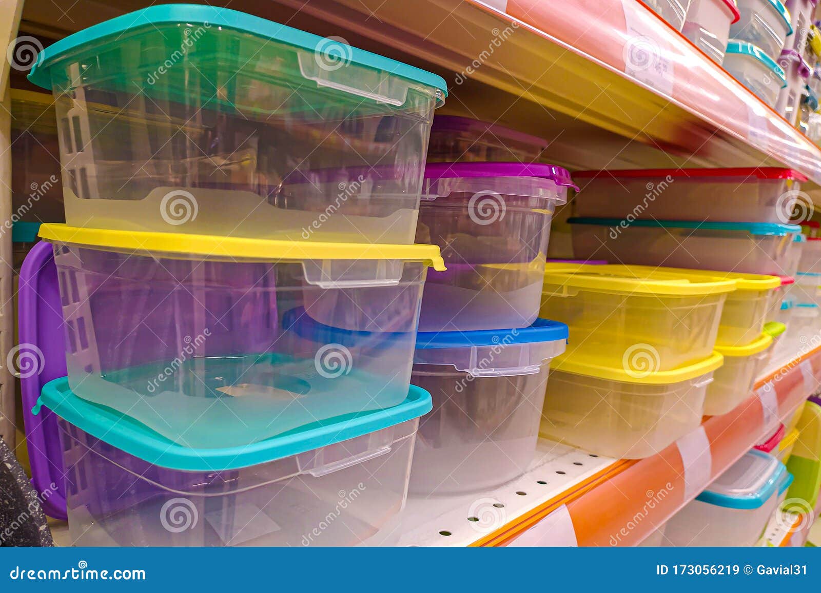 Plastic Food Containers on a Shelf in a Store. Colorful Containers on a ...
