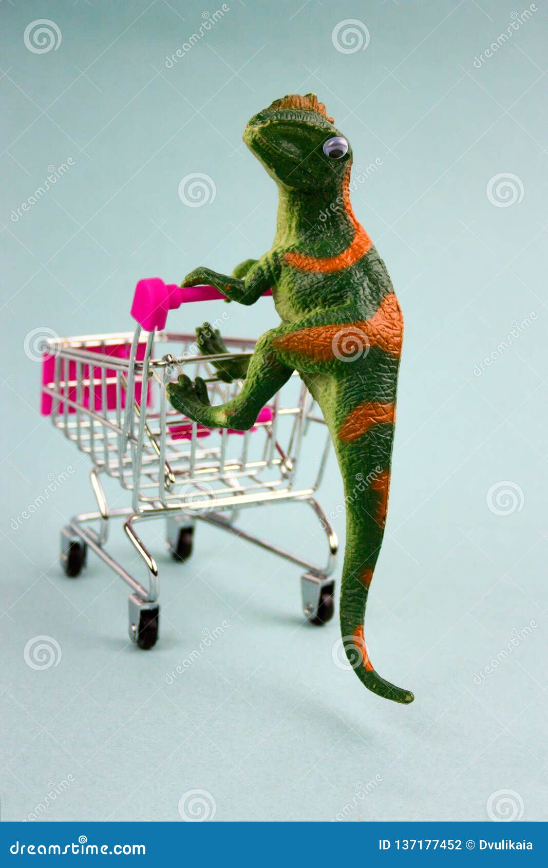 Green Dinosaur with Shopping Cart Stock Photo Image of dinosaur