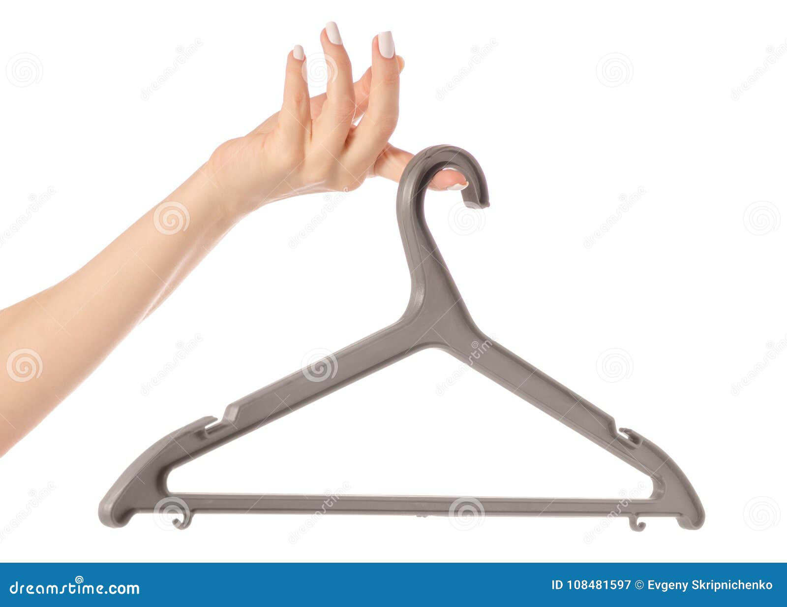 Plastic hanger in hand stock image. Image of hang, domestic 108481597
