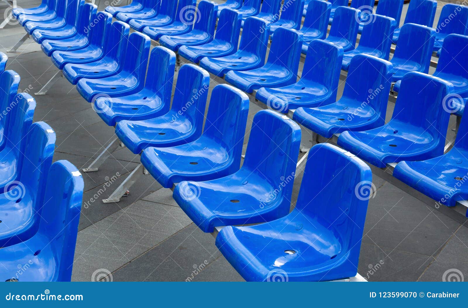 Plastic Hire Chairs in a Row Blue Color Stock Photo Image of bench, armchair 123599070