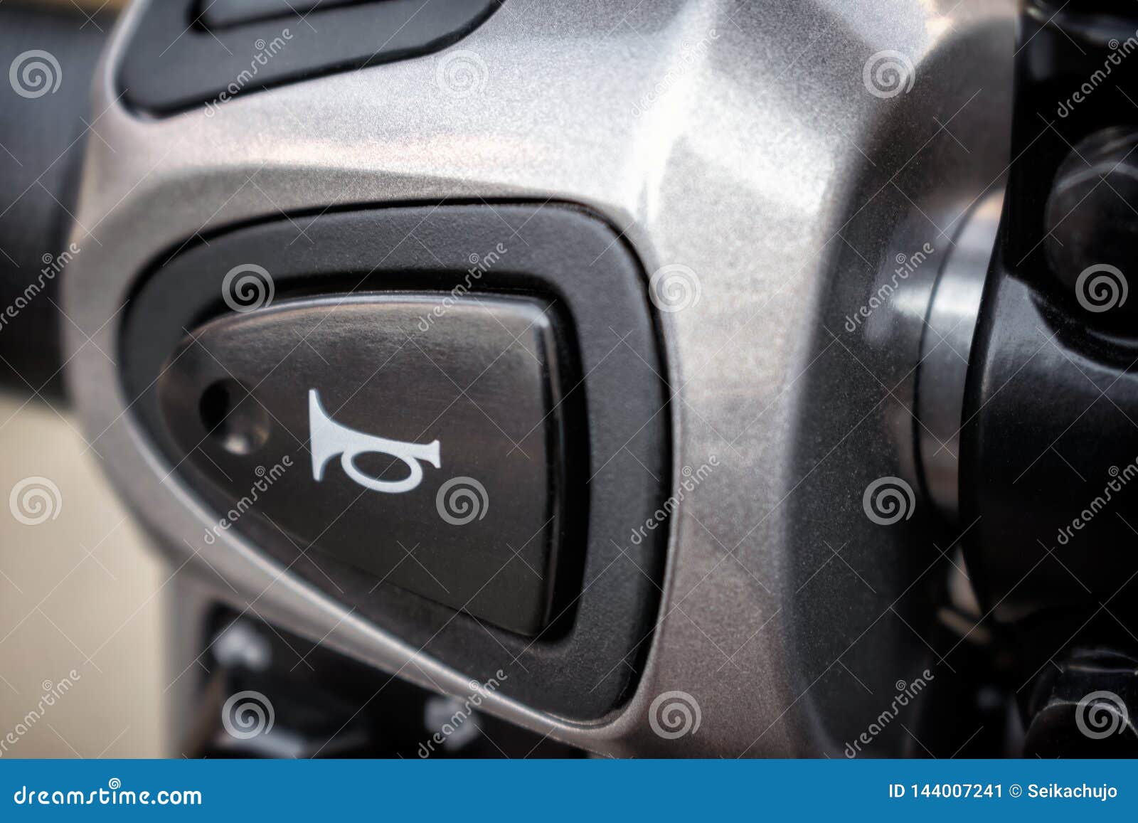 Plastic Horn Button an a Silver Motorcycle. Stock Image Image of