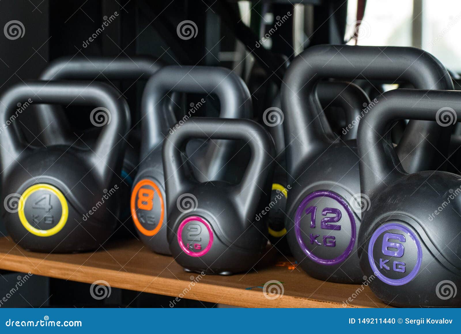 Plastic kettlebells stock photo. Image of bells, fitness 149211440