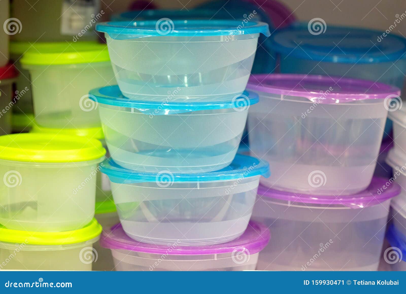 Plastic Kitchen Trays On The Shelf Of The Kitchen Cabinet Stock