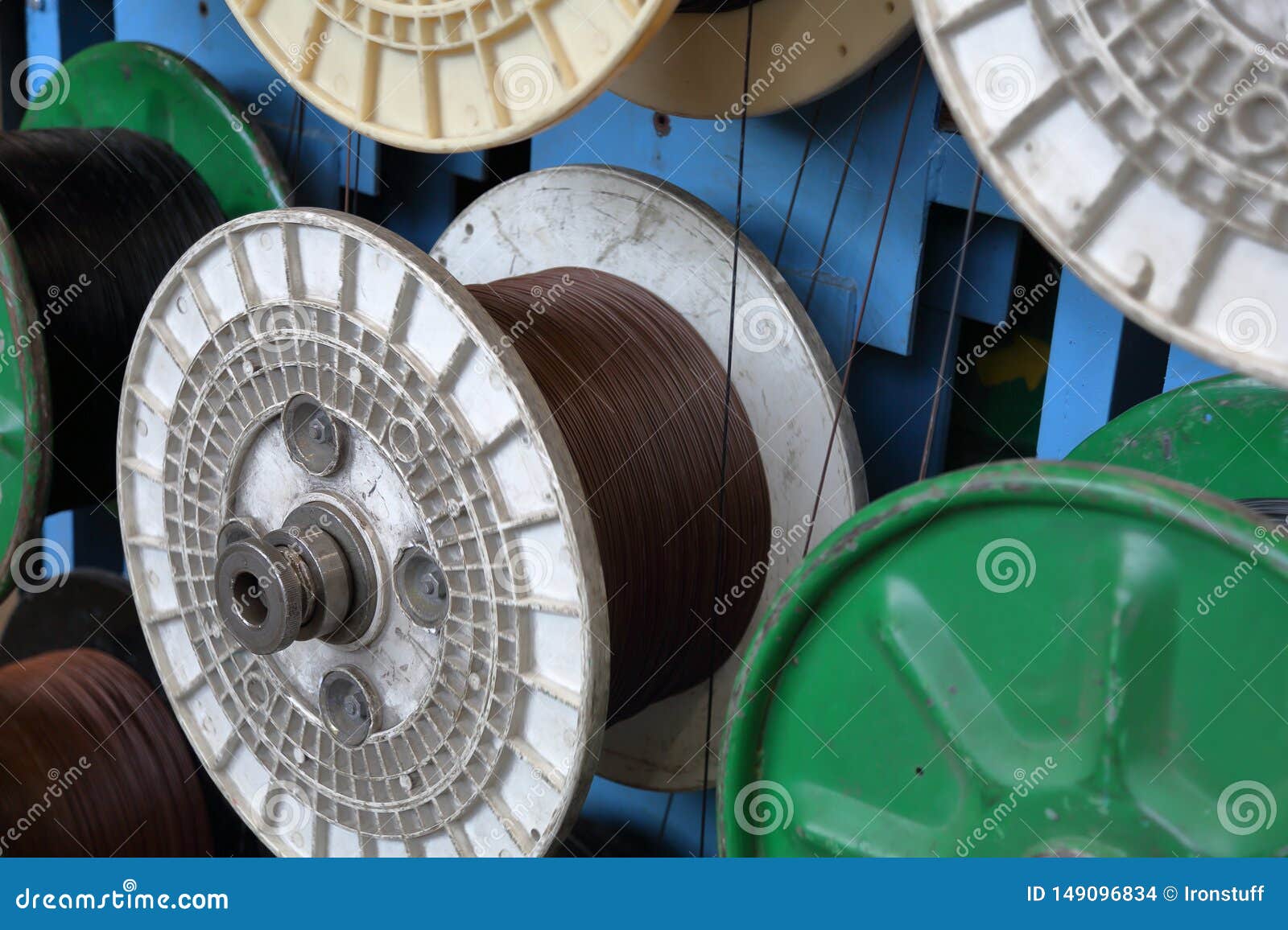 Plastic reels with cable stock photo. Image of coils 149096834
