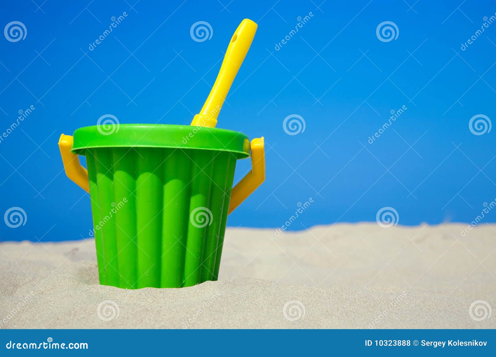 Plastic Spade and Bucket in Sand Stock Photo - Image of copy, resort ...