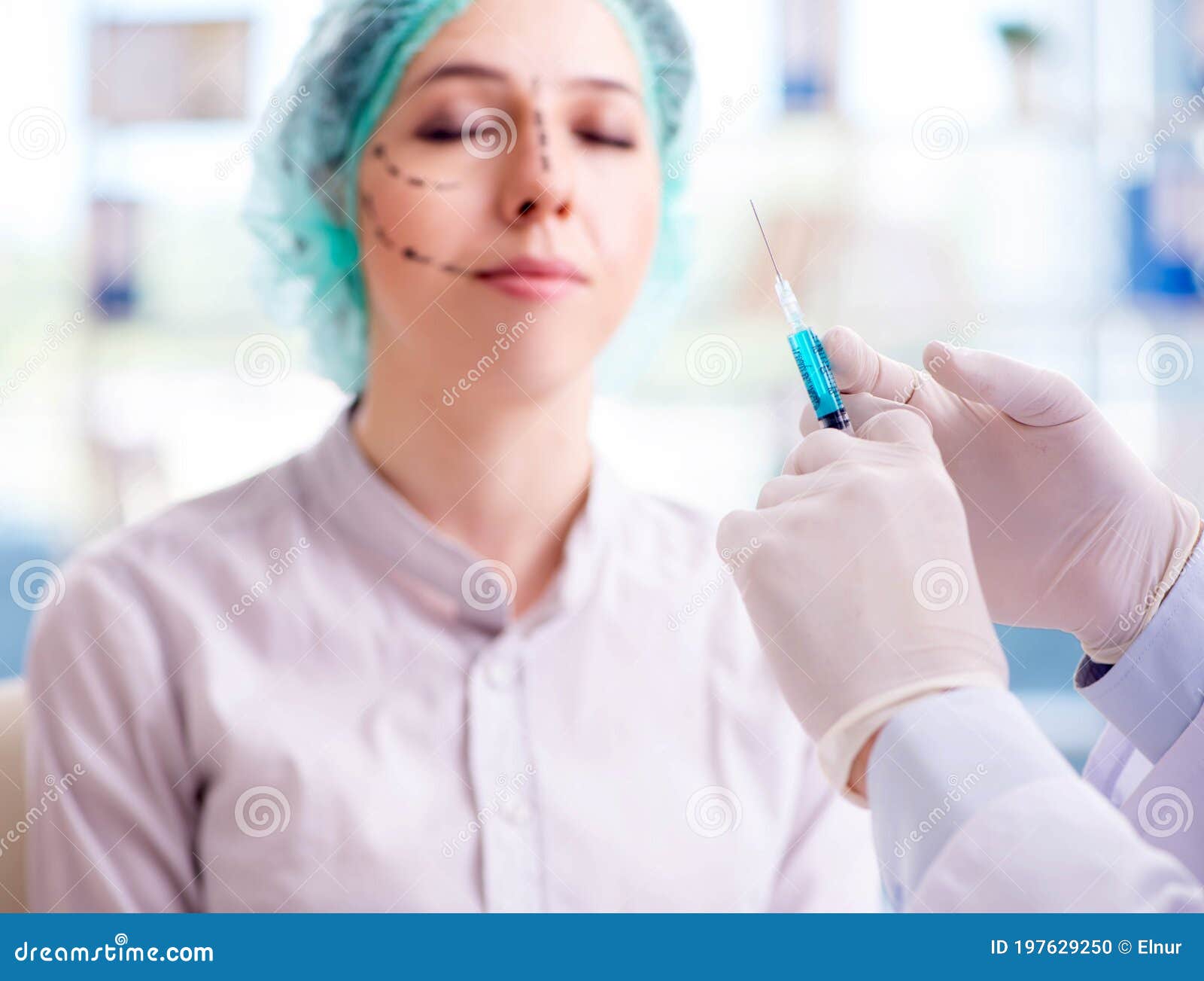 Plastic Surgeon Preparing for Operation on Woman Face Stock Photo