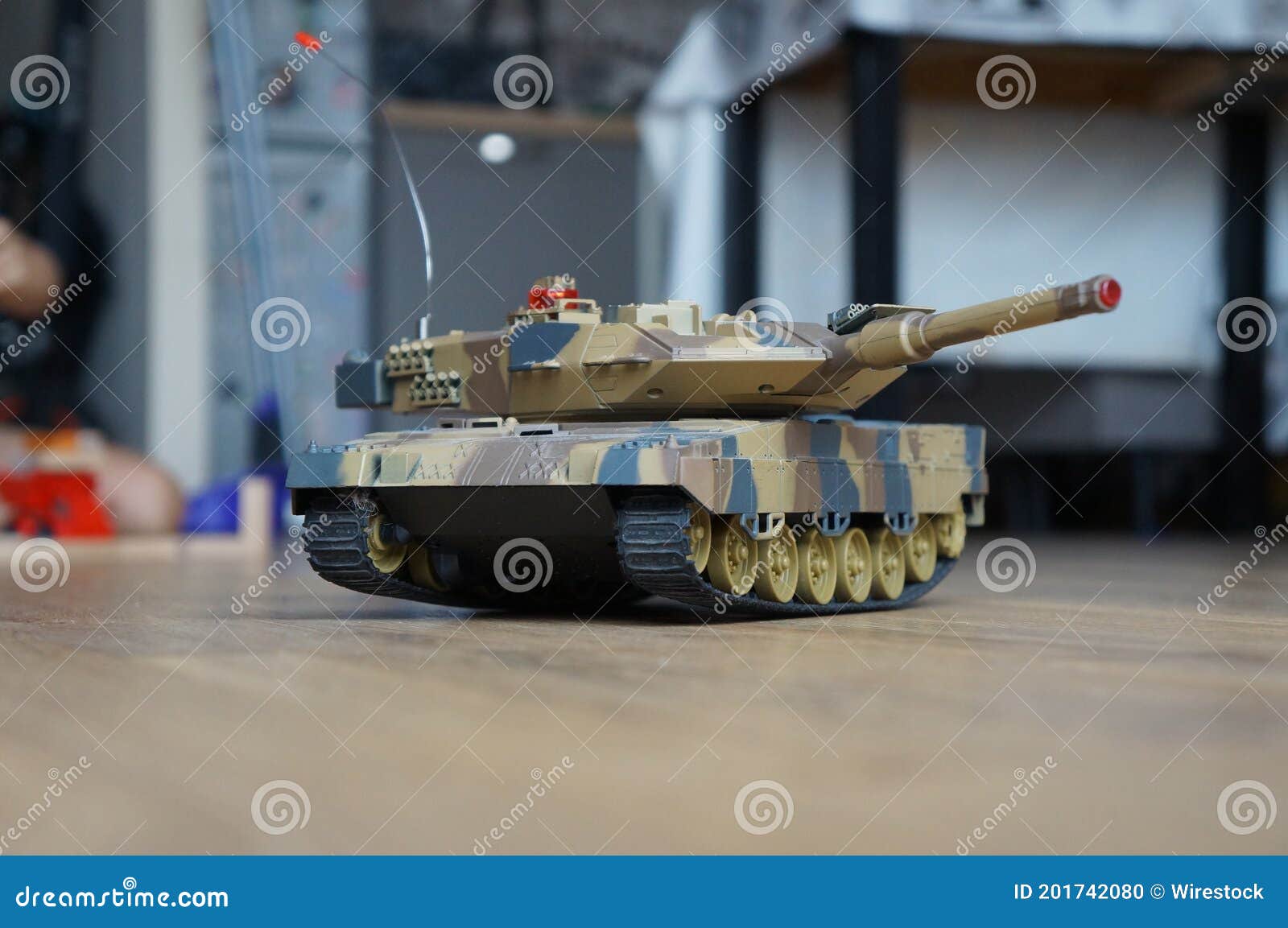 Plastic Tank Toy on the Floor Stock Photo Image of play, material