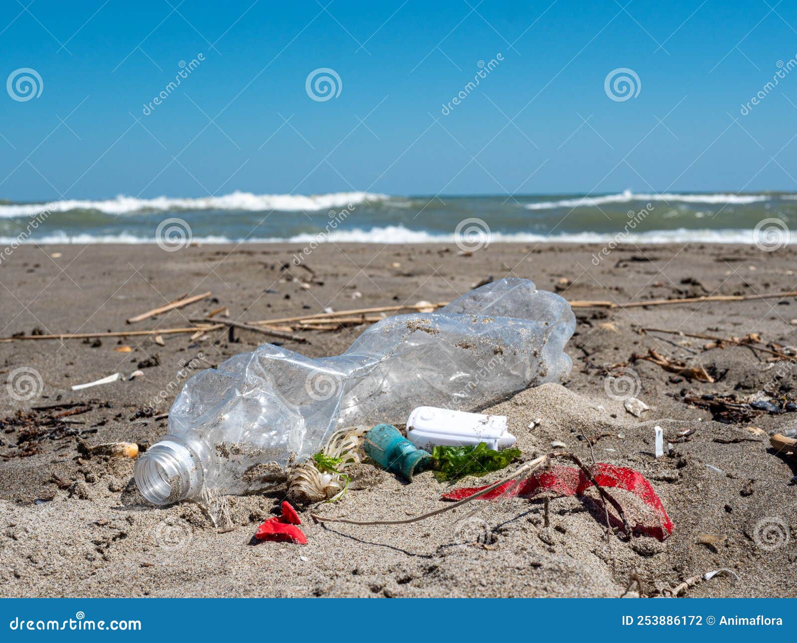 Plastic Waste Lies in the Sand on the Beach Stock Photo - Image of sand ...