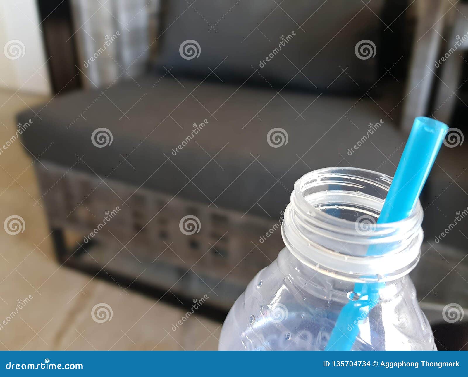Plastic water bottle stock photo. Image of straw, plastic 135704734