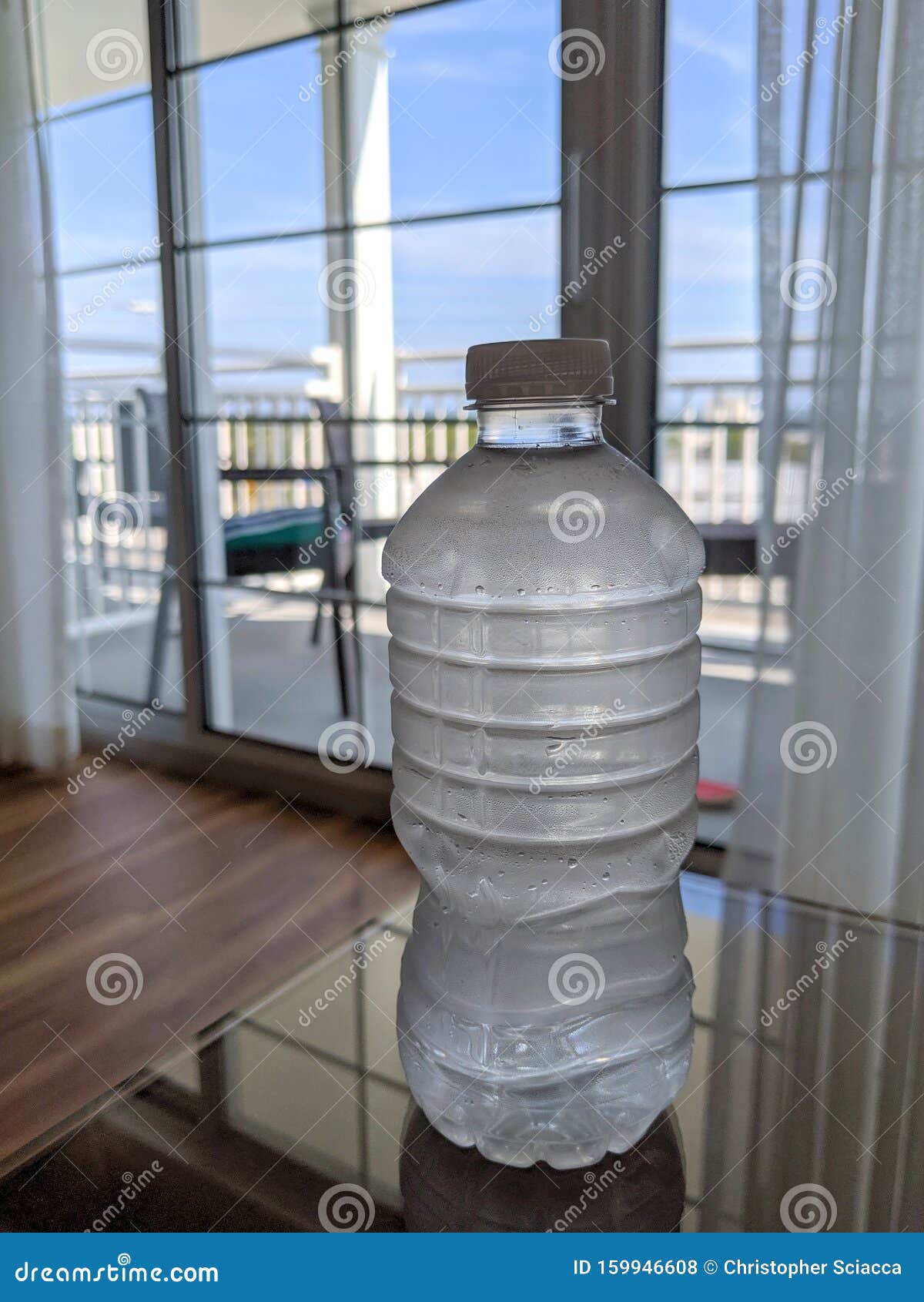 Plastic Water Bottle on Table on Sunny Day Stock Photo Image of care