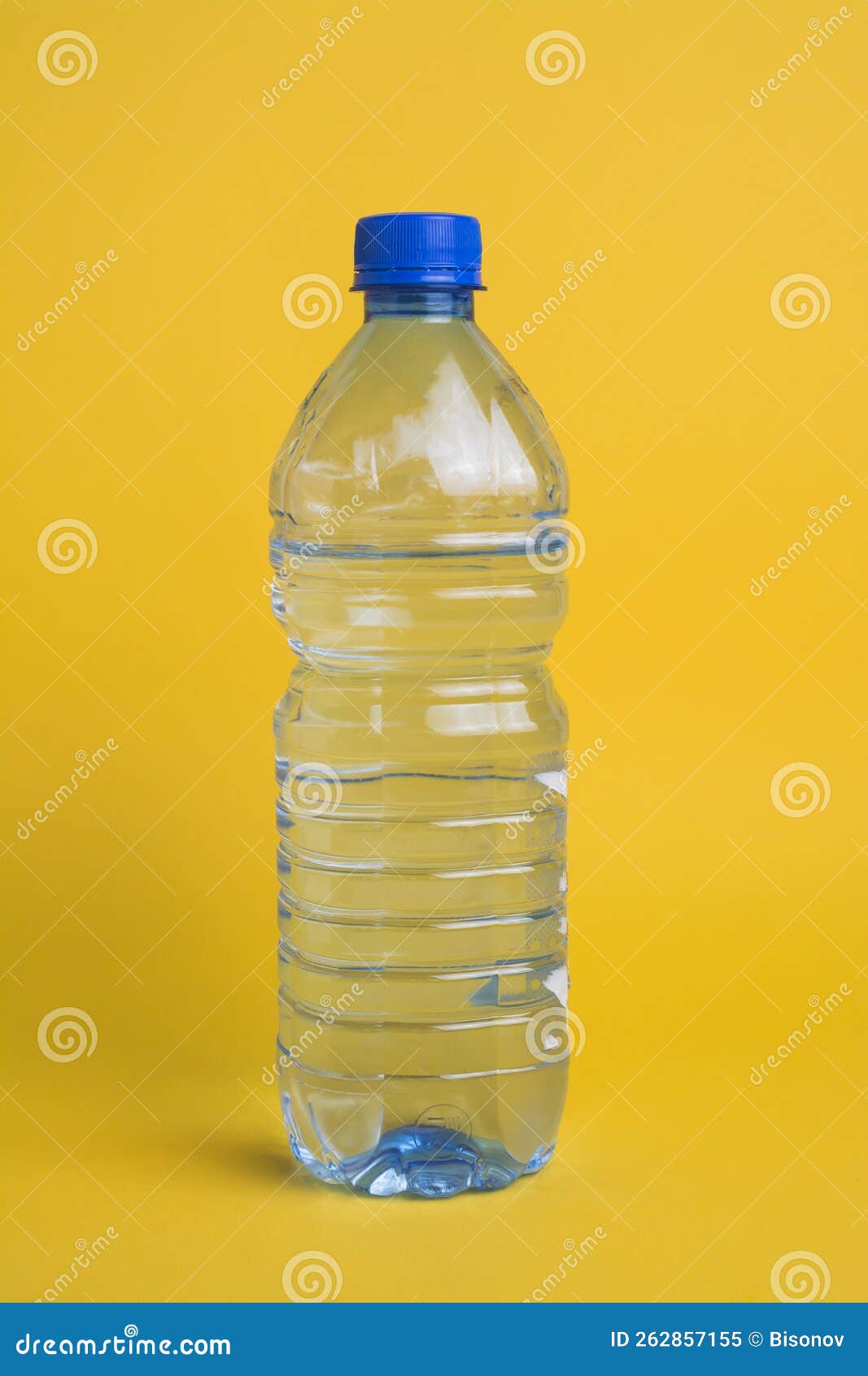 Plastic Water Bottle on Yellow Stock Image Image of beverage, bottled