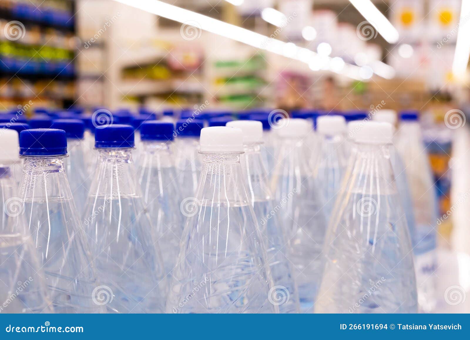 Water Bottles with Blue Caps in Supermarket Stock Photo Image of