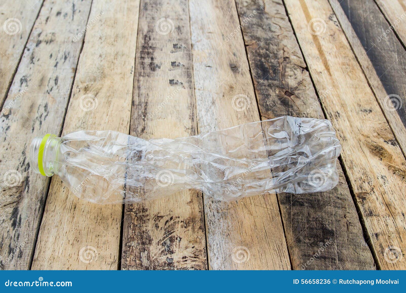 Plastic Water Bottles For Recycle On The Wooden Table Stock Photo