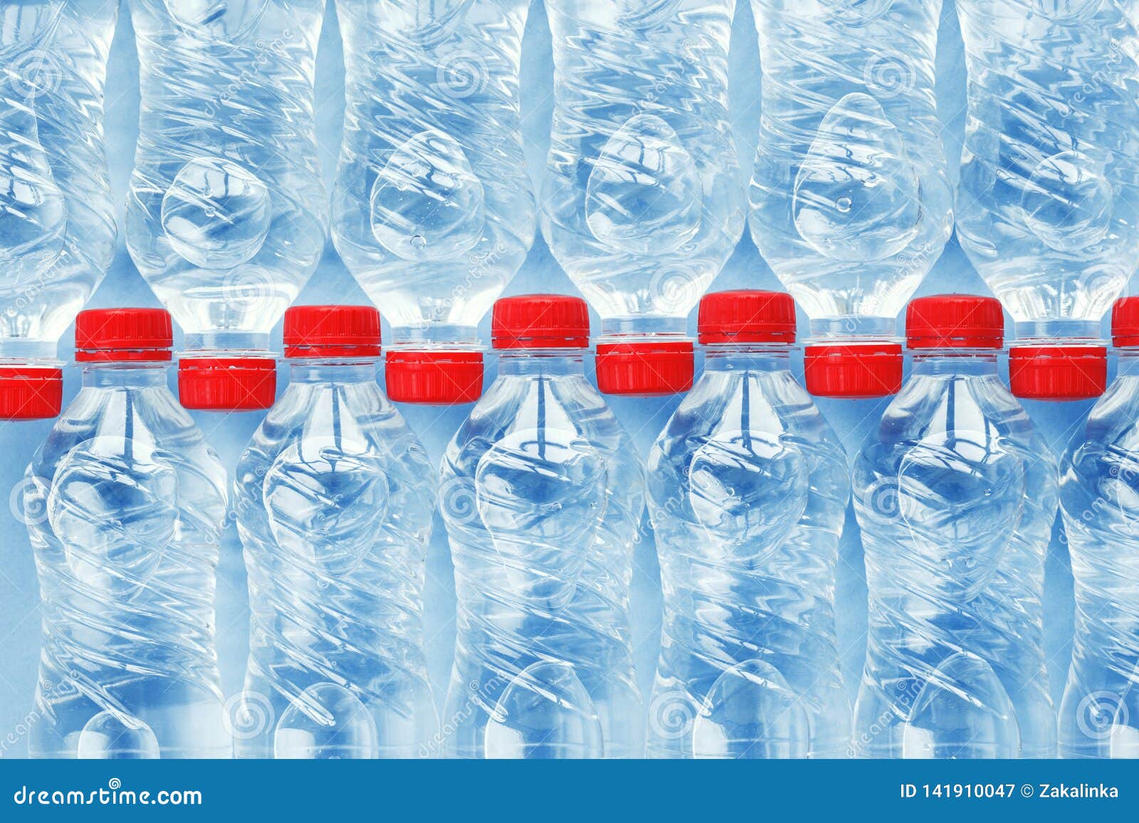 Plastic water bottles stock image. Image of caps, liquid 141910047