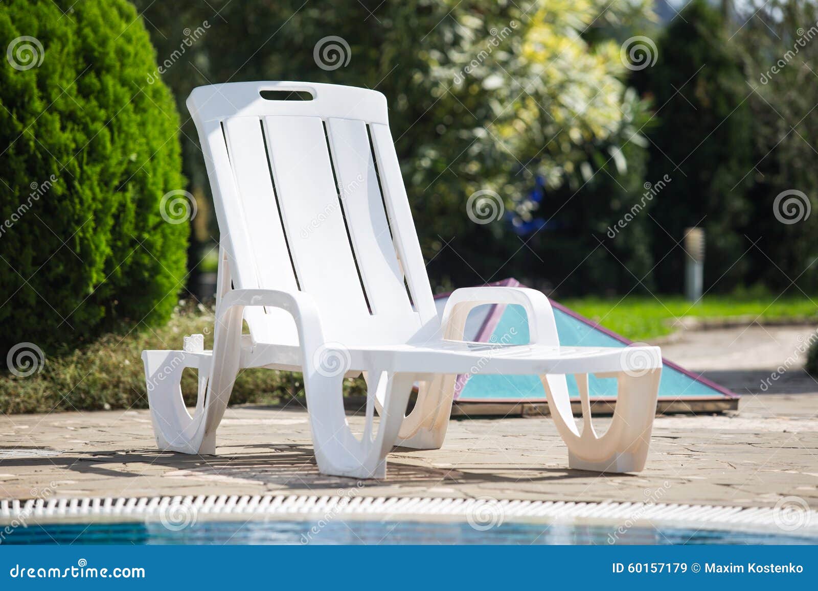 green plastic sun lounger