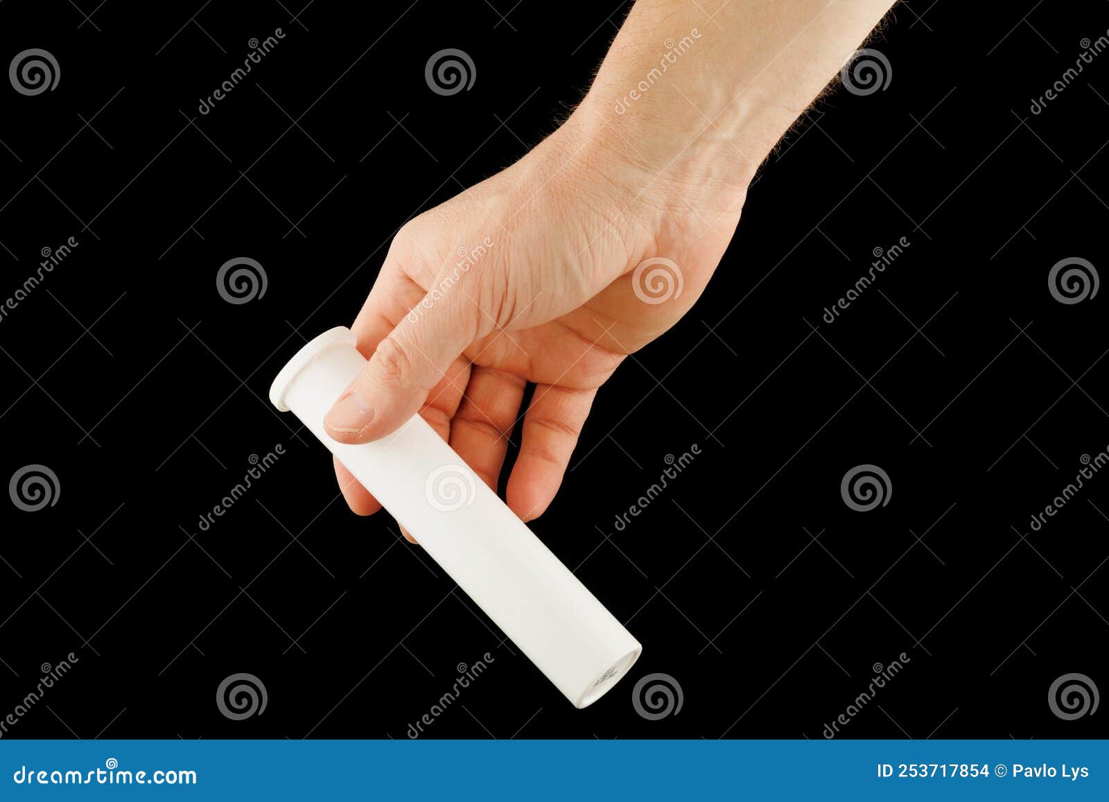Plastic white tube in hand stock photo. Image of group 253717854