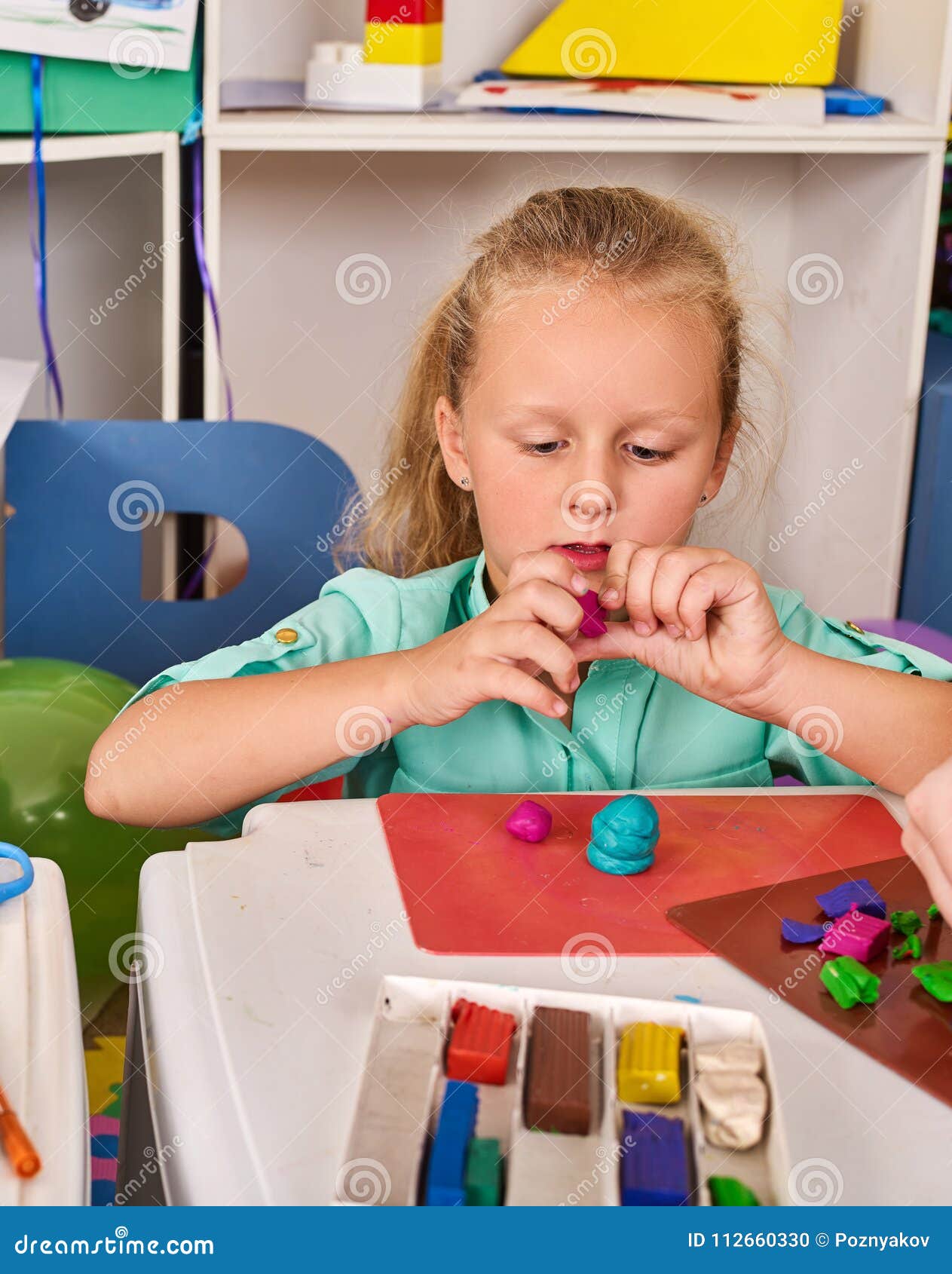 Plasticine Modeling Clay. Child Dough Play in School. Stock Photo