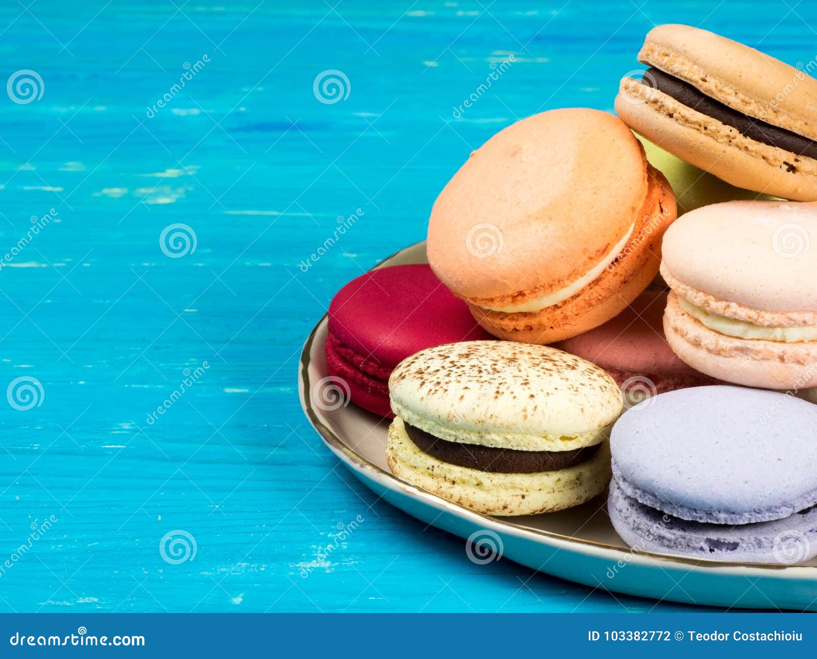 A Plate of Brightly Colored French Macarons Stock Photo - Image of ...