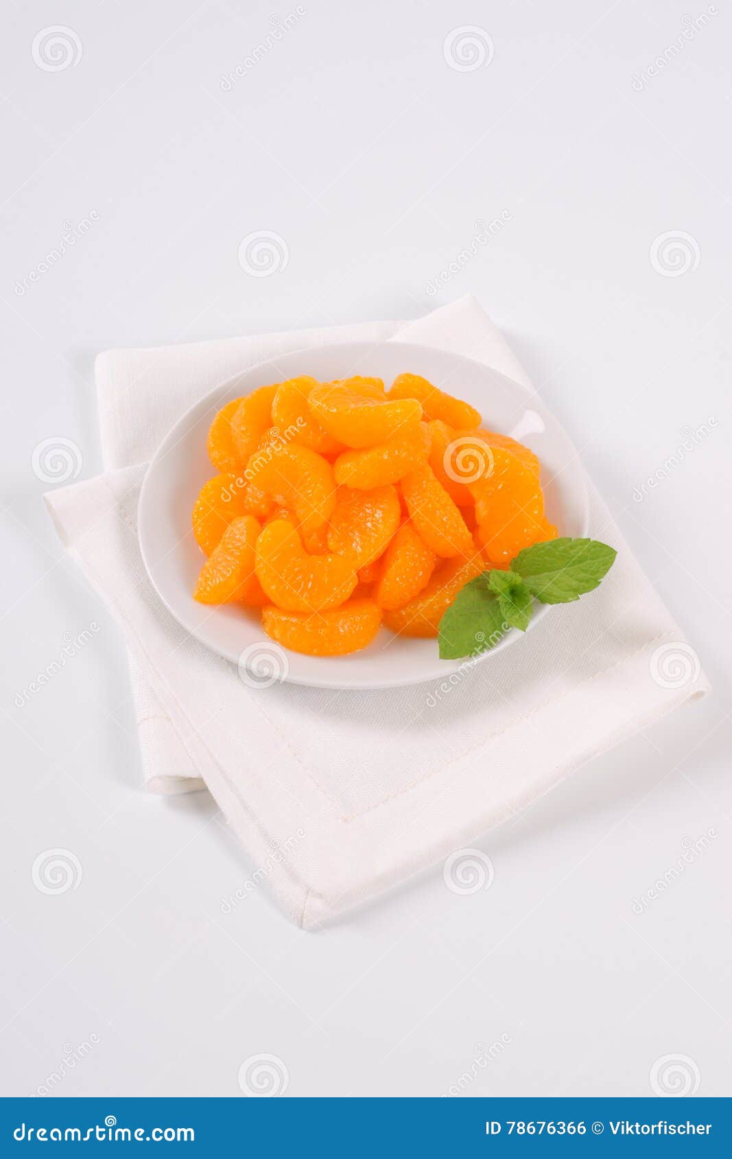 Plate of canned tangerines stock photo. Image of heap 78676366