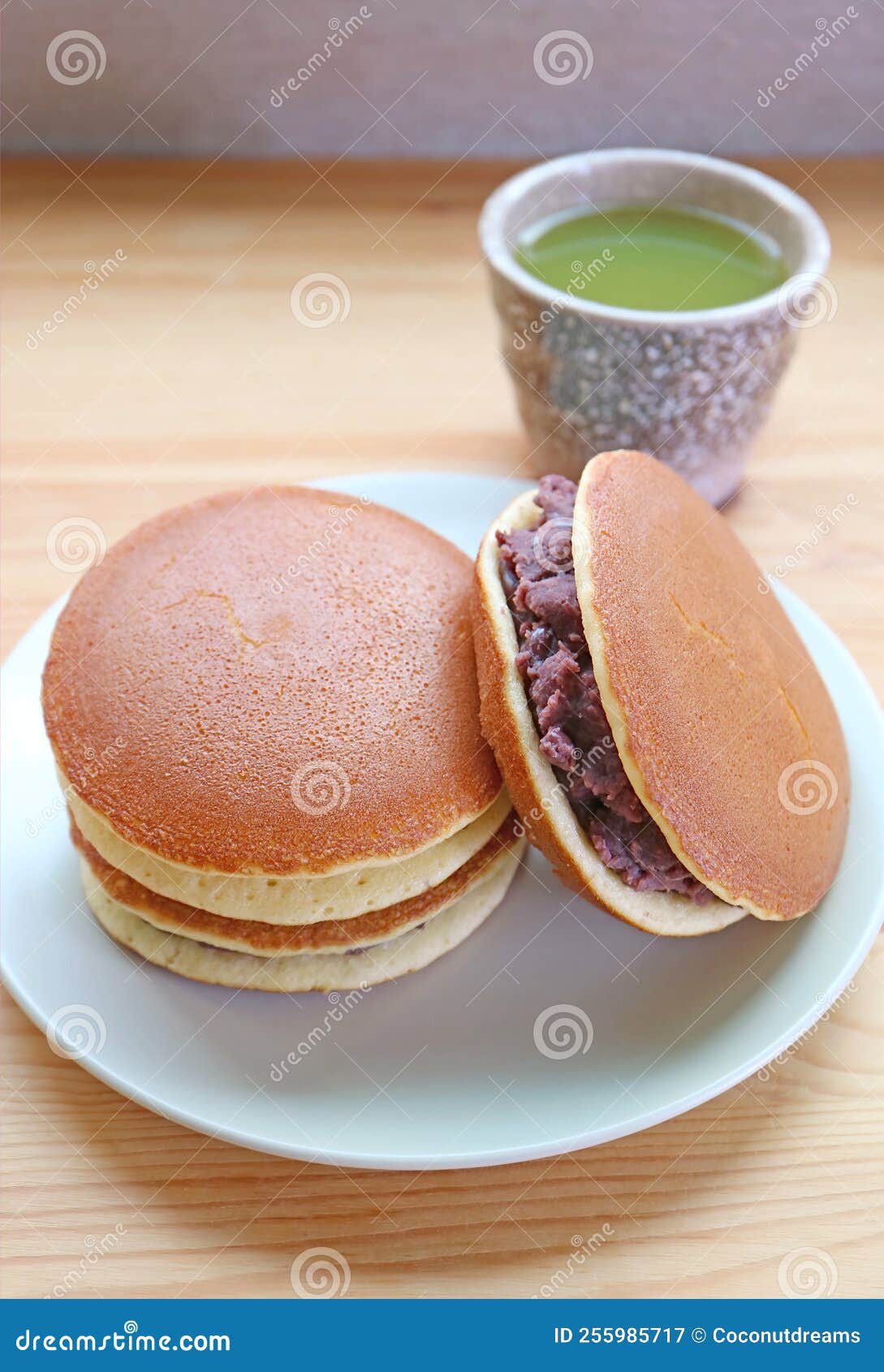 A Plate of Delectable Dorayaki with a Cup of Hot Matcha Green Tea Stock