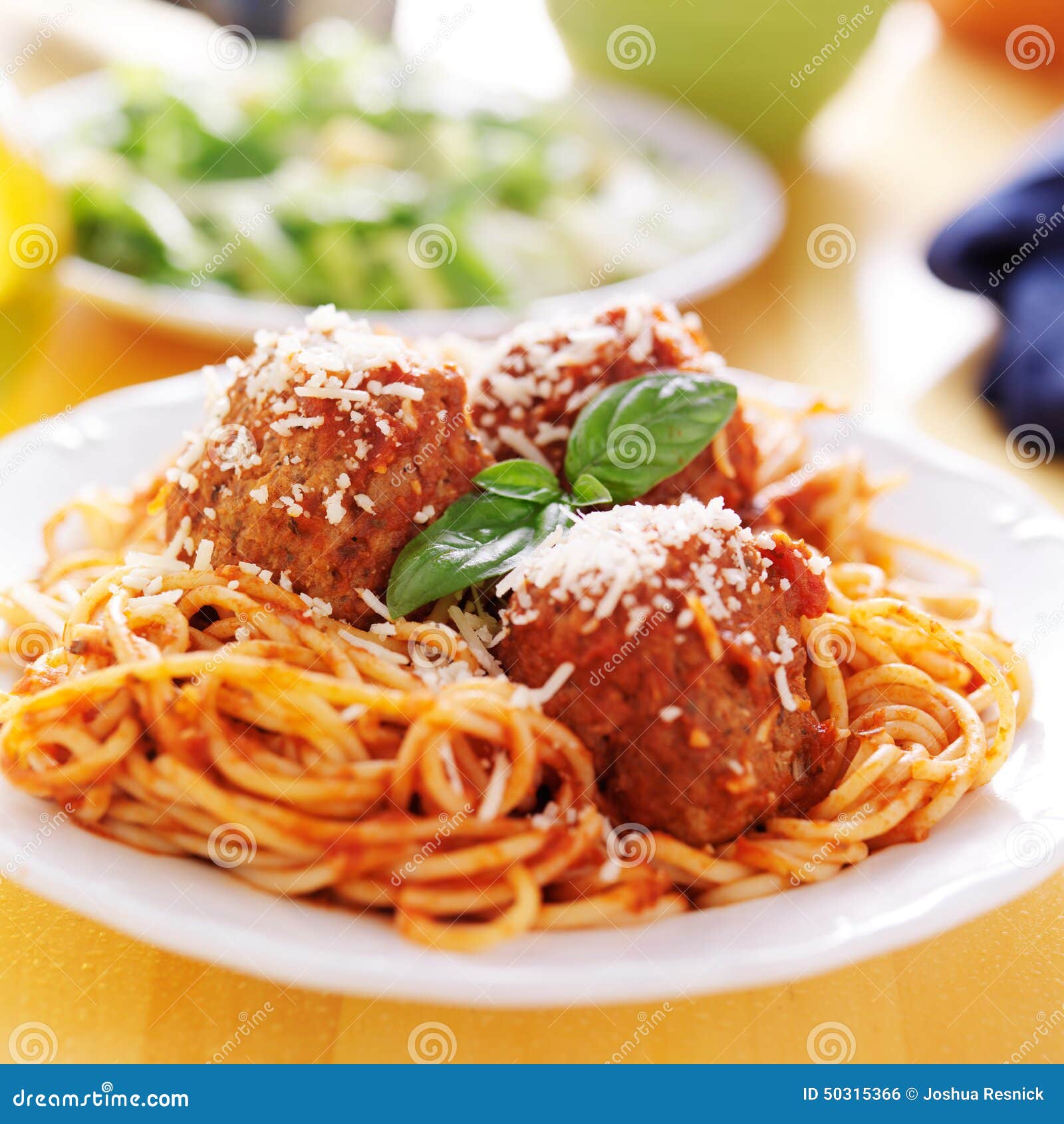 plate of italian spaghetti and meatballs