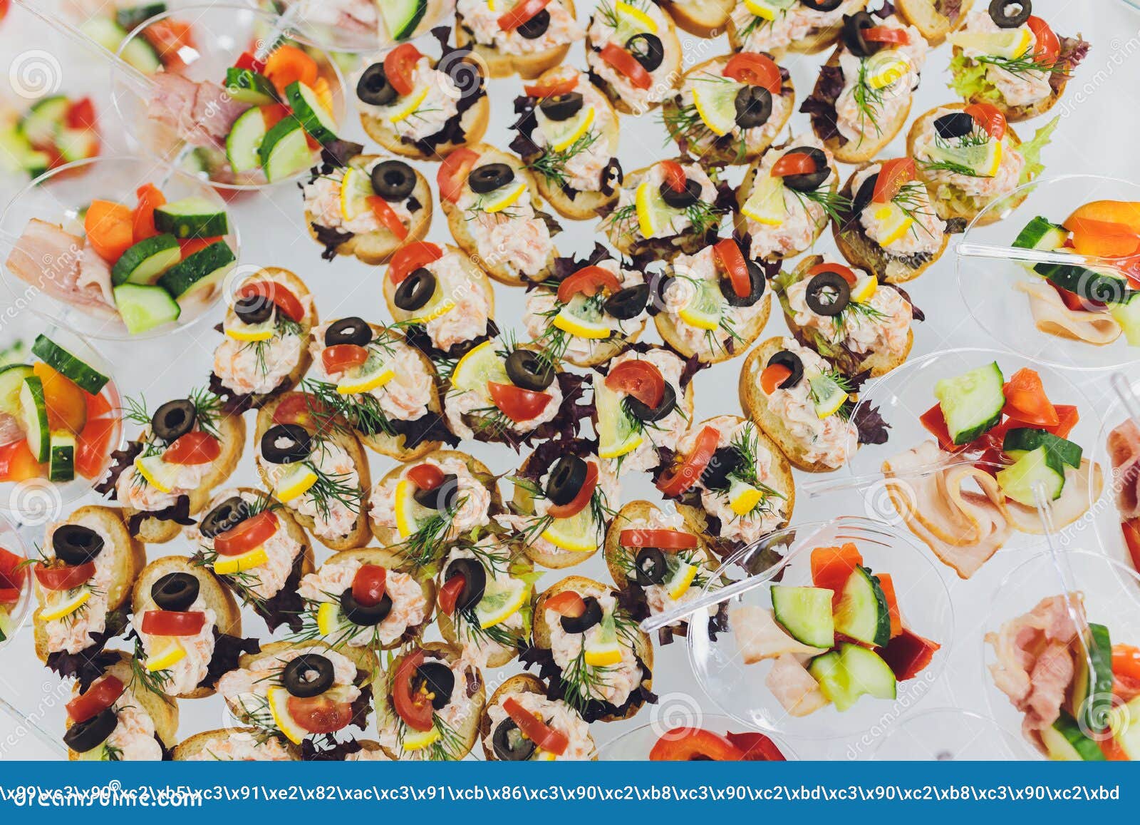 Plate of Many Mini Bite Size Sandwich Appetizers. Stock Photo Image