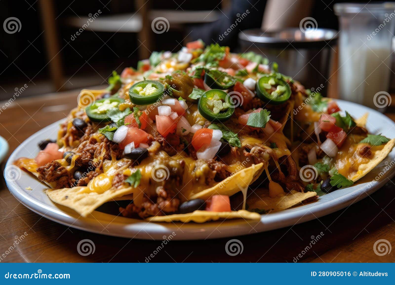 Plate of Nachos with Different Toppings, Featuring Refried Beans