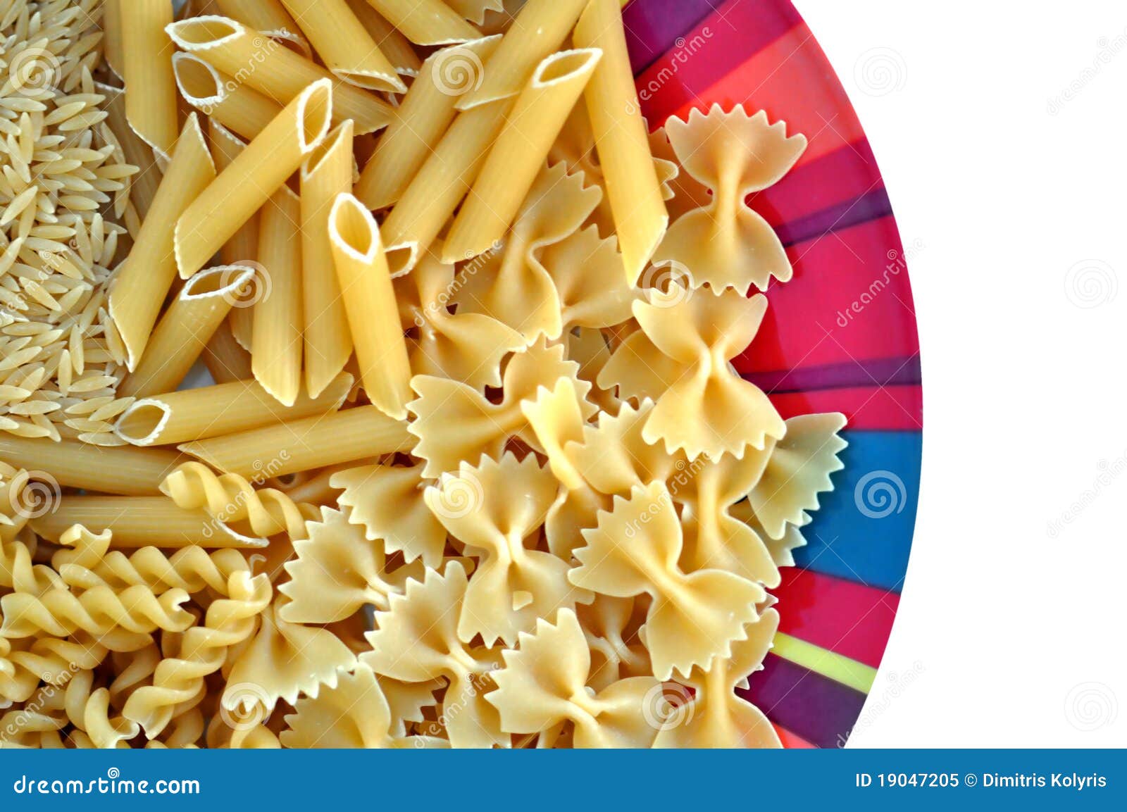 Plate with pasta variety stock image. Image of farfalle 19047205