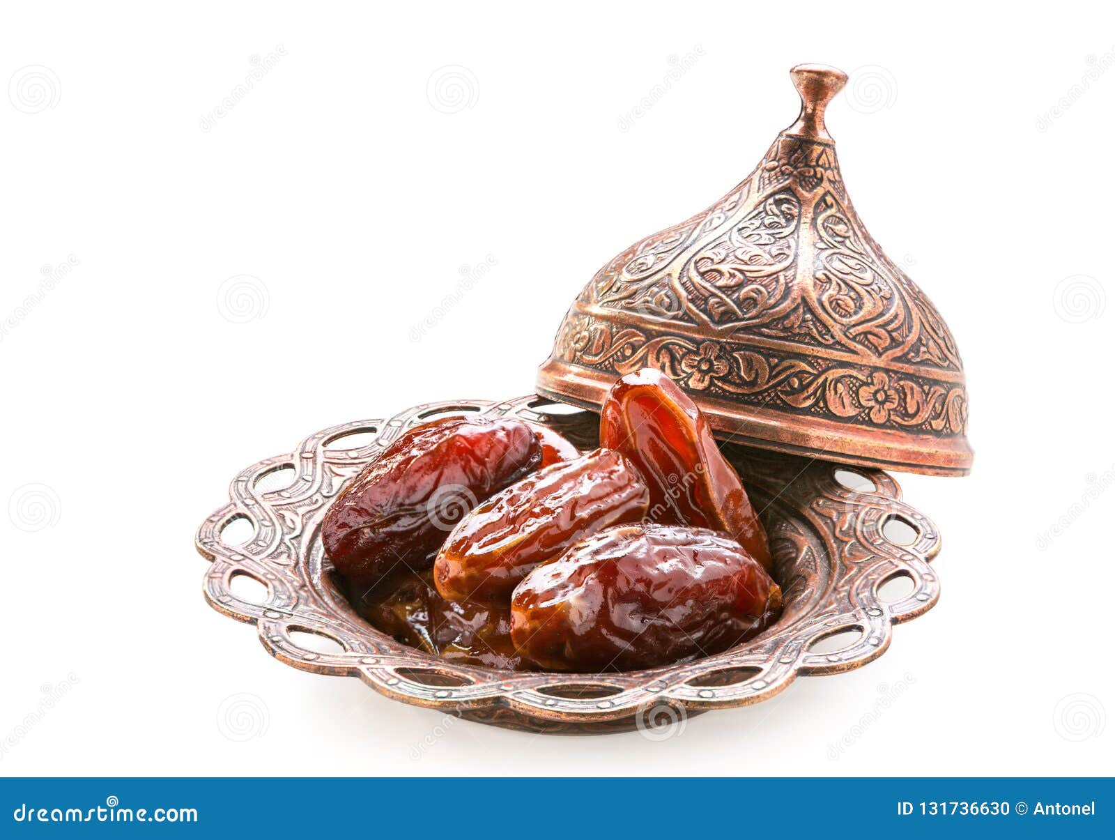 plate of pitted dates  on a white background