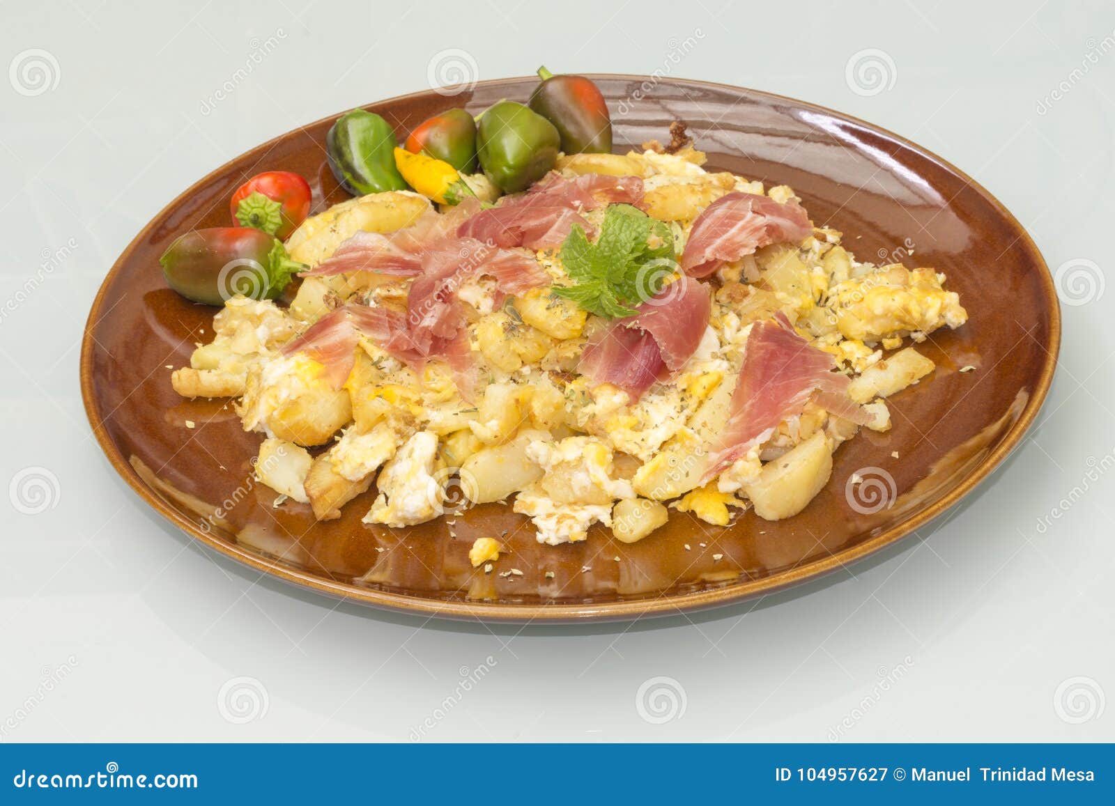 A Plate of Scrambled Potatoes with Eggs and Ham Stock Image Image of cuisine, vegetable 104957627