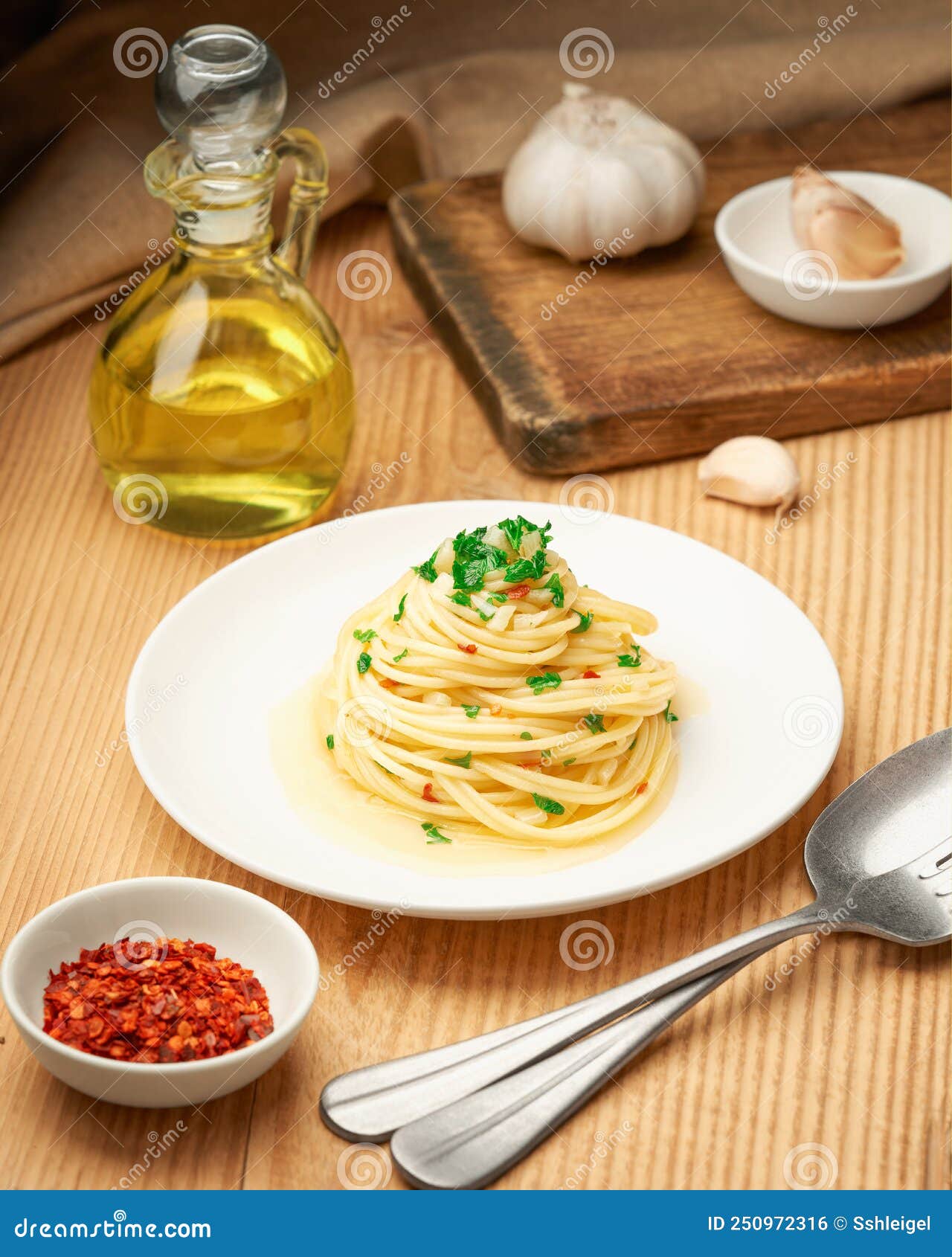 Plate of Spaghetti AGLIO E OLIO and Ingredients Vertical Frame Stock