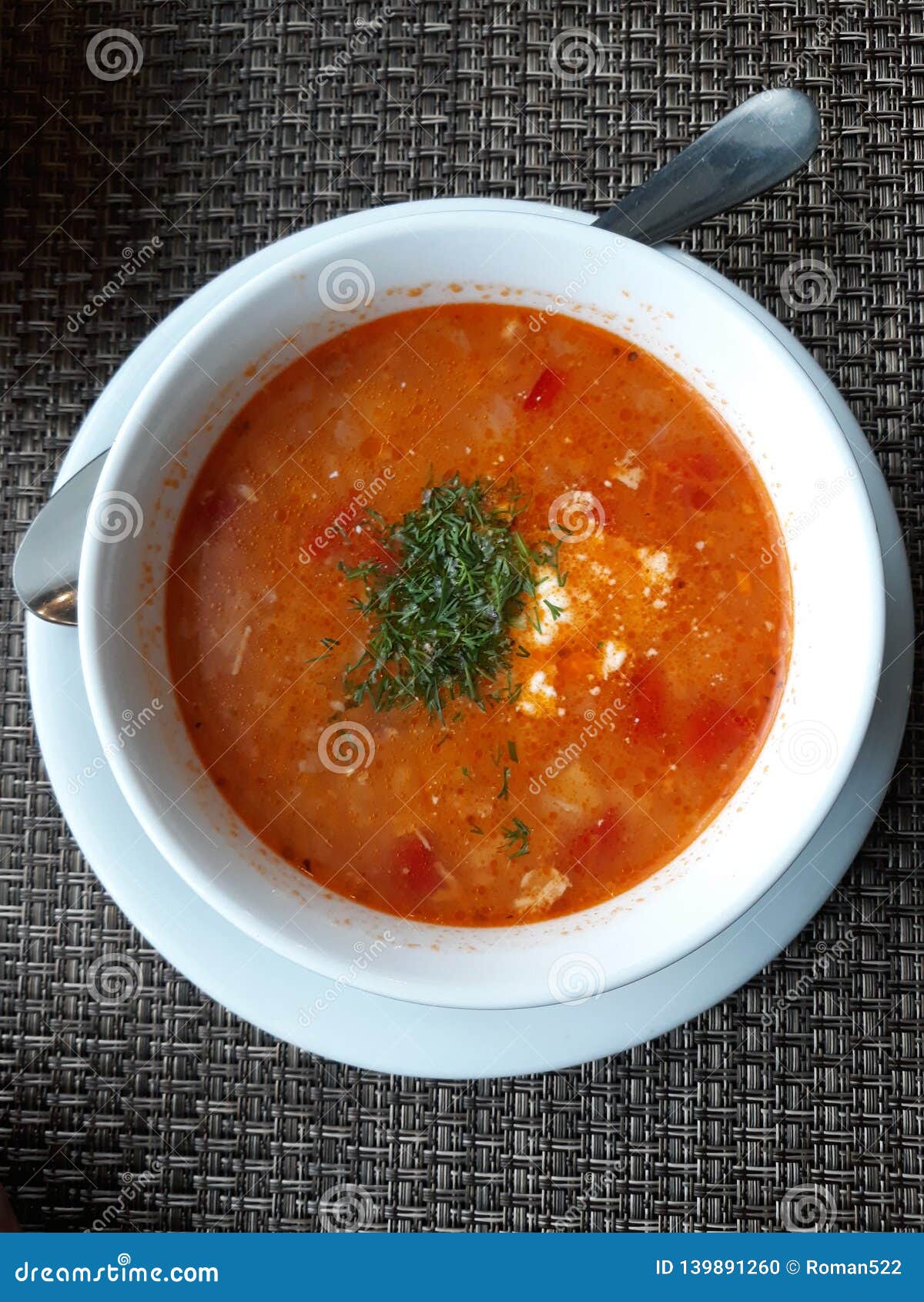 A plate with tomato soup. stock photo. Image of soup 139891260
