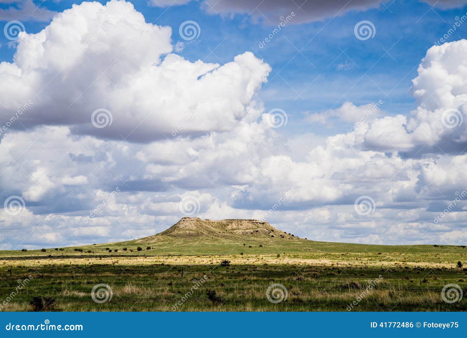 plateau in field with cloudscape