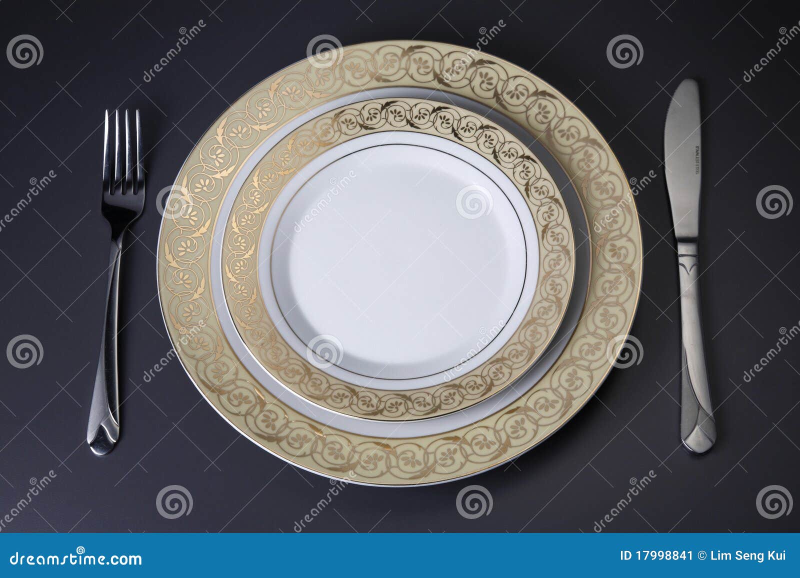 Plates and cutlery stock image. Image of table, tool 17998841