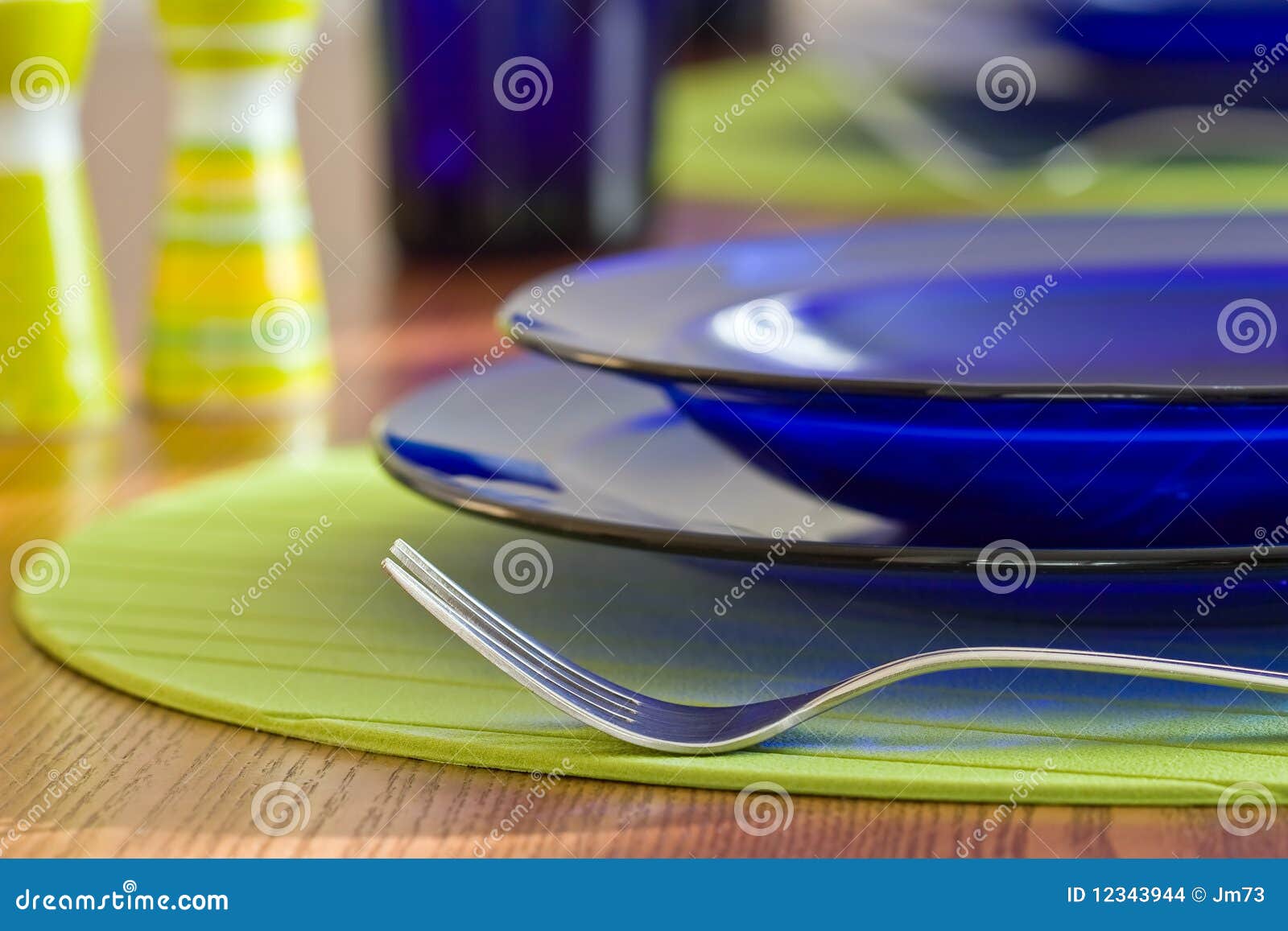 Plates and Cutlery on the Table Stock Photo Image of plate, food 12343944