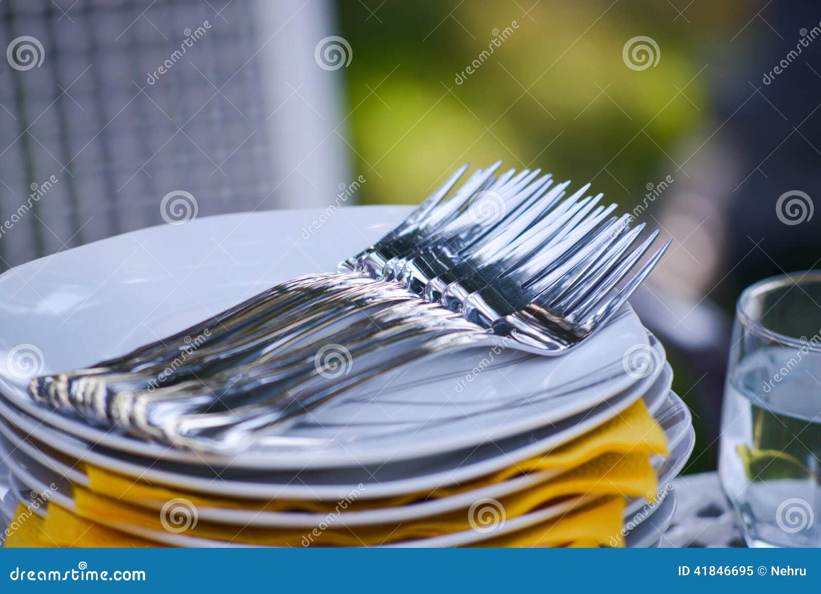 Plates and forks stock image. Image of stacked, plates 41846695