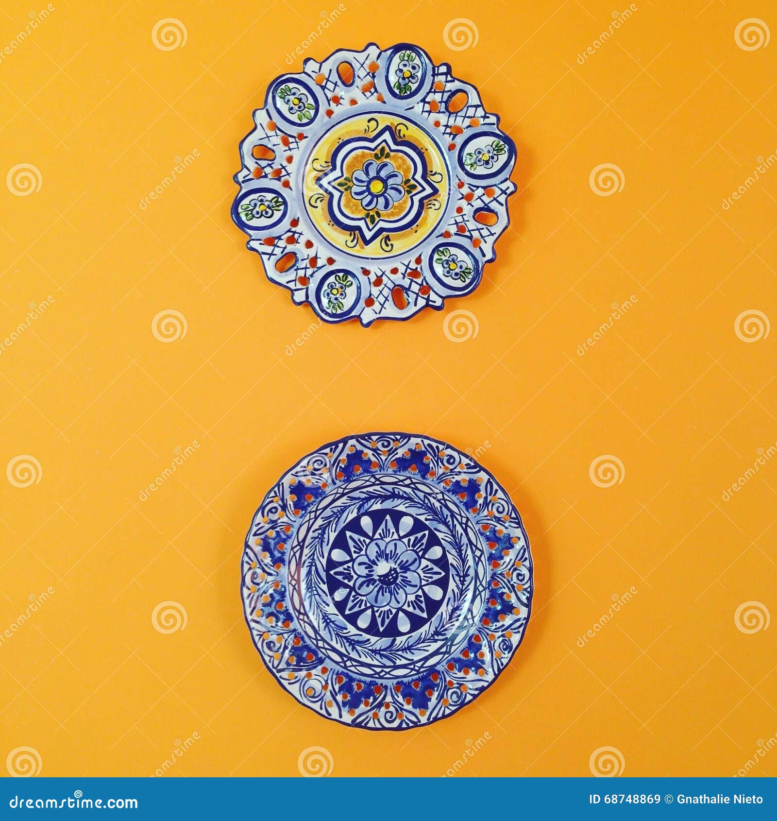 Plates stock image. Image of yellow, deco, wall, plates 68748869