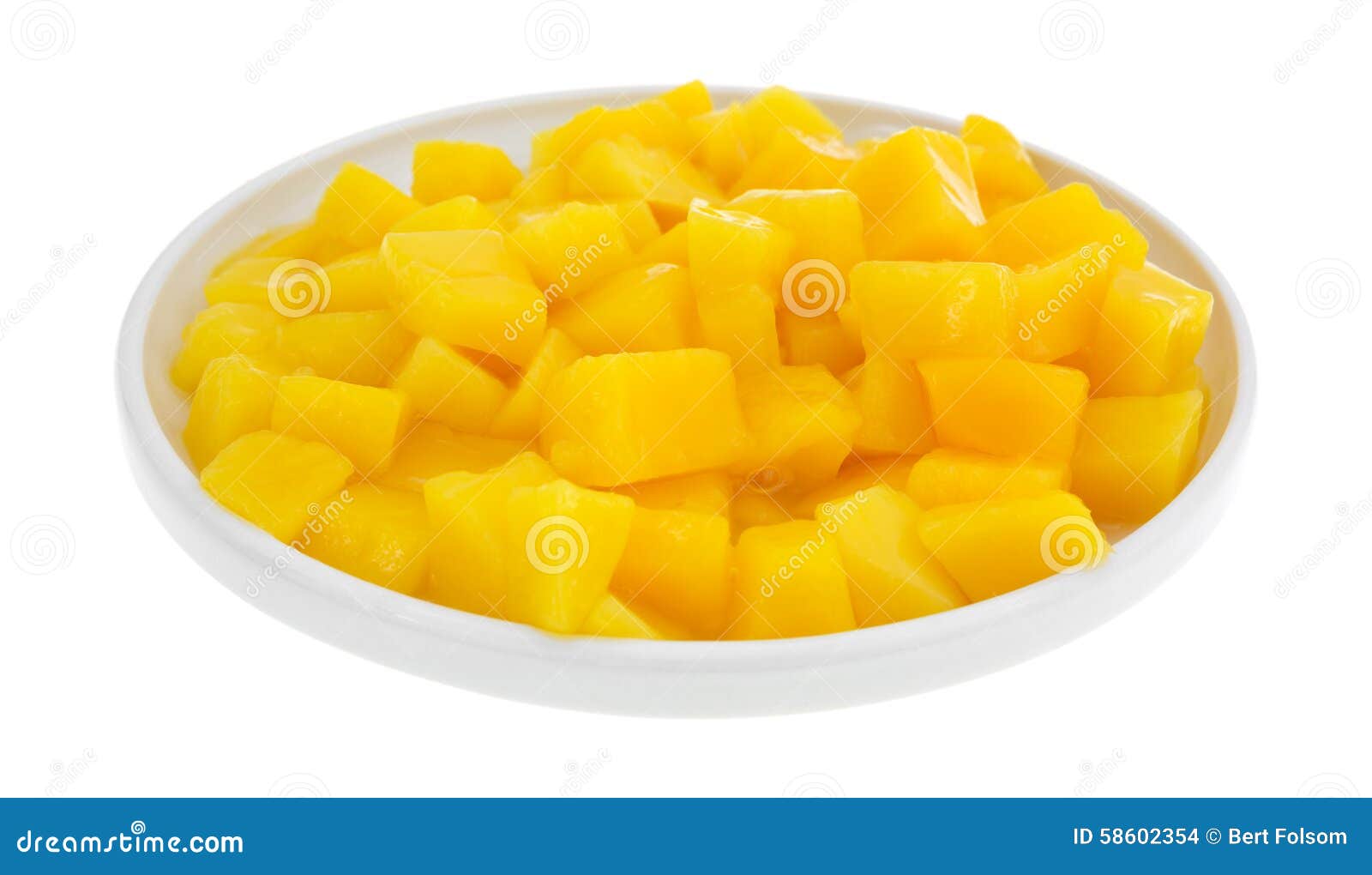 Plato De Los Pedazos Conservados Del Mango Foto de archivo Imagen de dulce, maduro 58602354