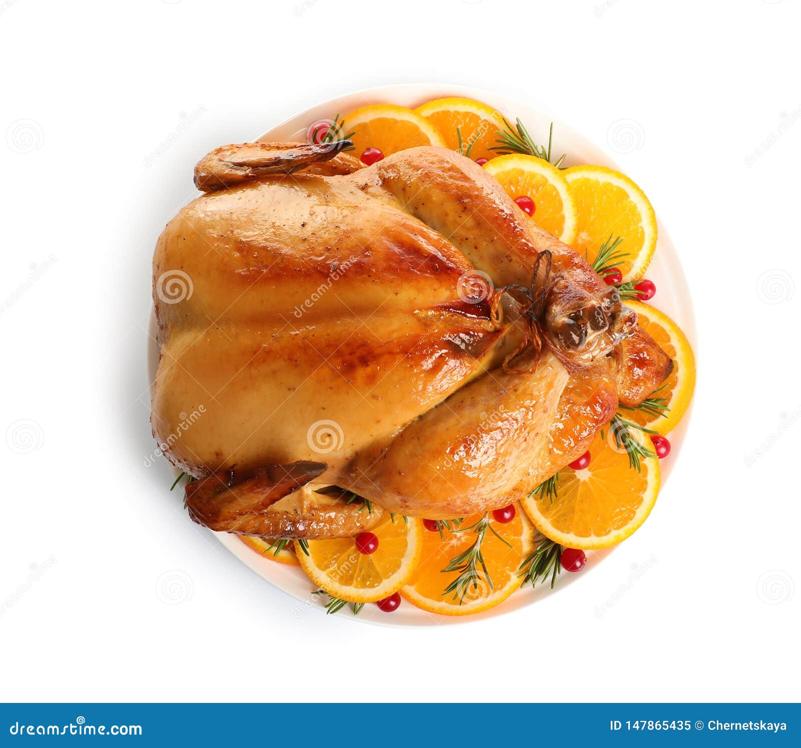 Platter Of Cooked Turkey With Garnish On White Background Stock Image