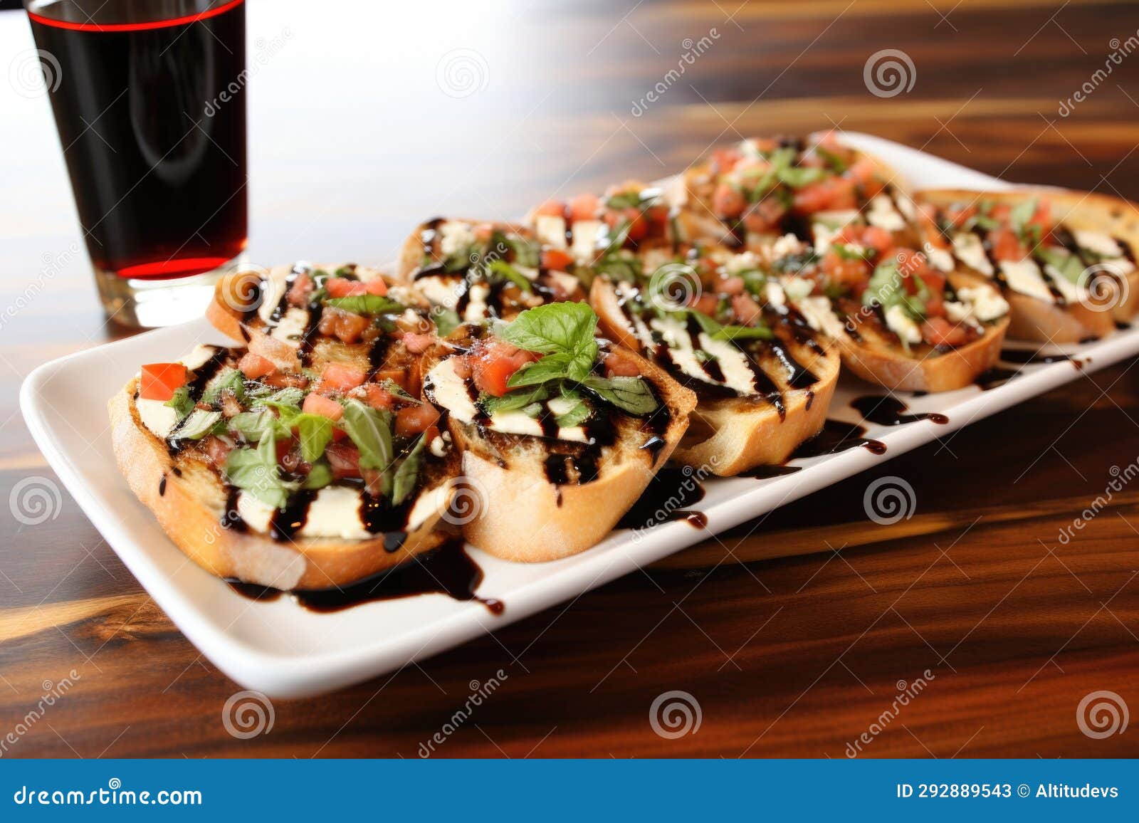 Platter with Goat Cheese Bruschetta and Balsamic Vinegar Glaze Stock
