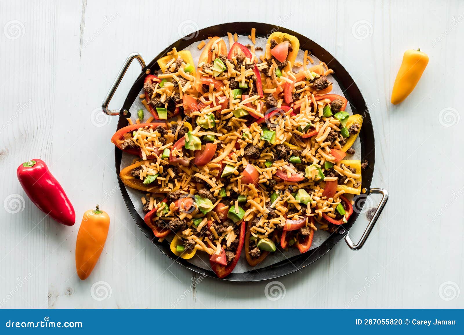 A Platter of Mini Bell Pepper Nachos Ready To Go into the Oven. Stock