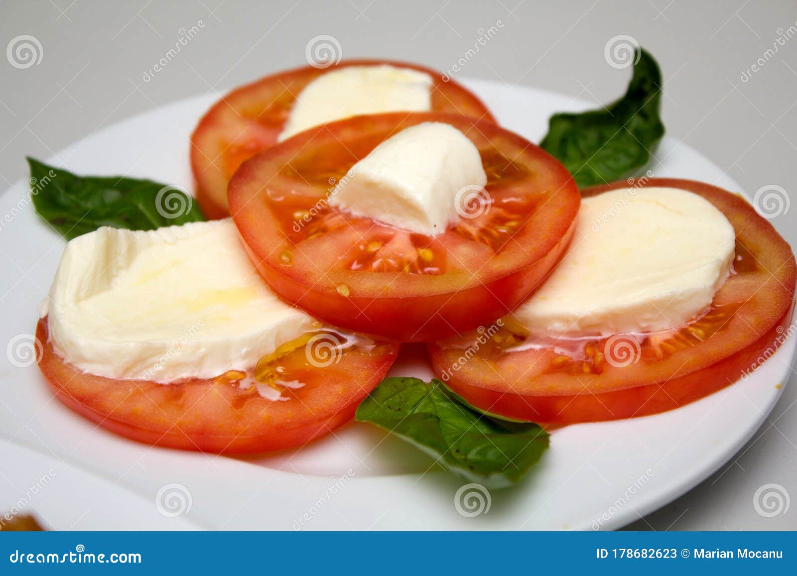 platter with tomatoes and cheese