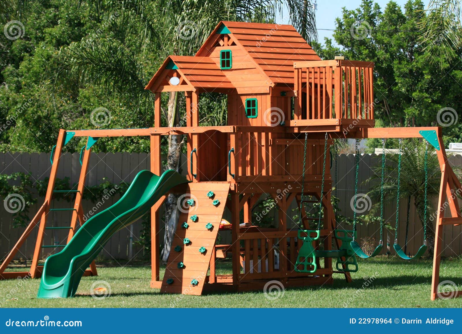 garden playhouse with slide and swing