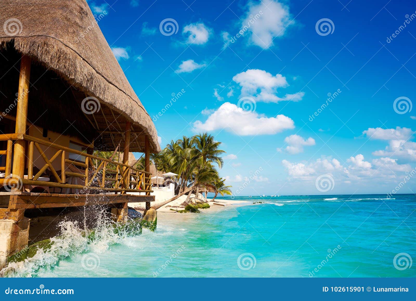 playa del carmen beach palapa in mexico