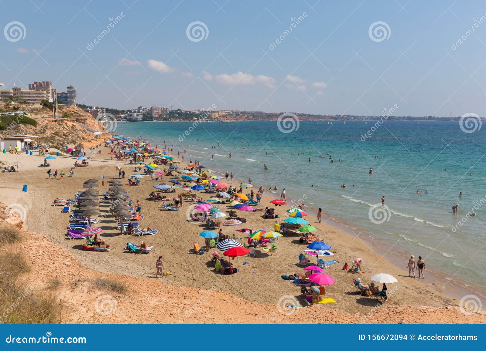 playa vistamar beach mil palmeras costa blanca spain with people sunbathing on the beach